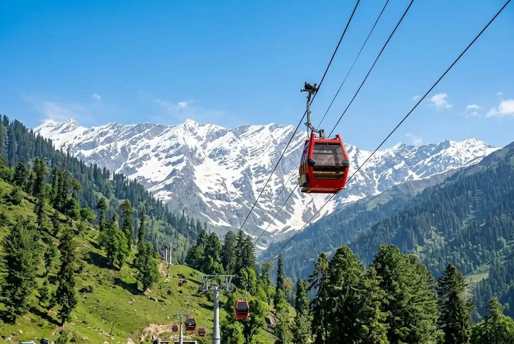 Solang Valley ropeway gondola rising above the meadow near Manali